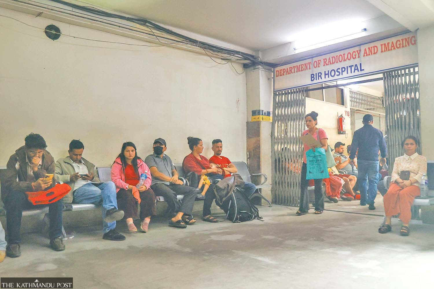 Insurance cuts at government hospitals compel patients to pay for private care
